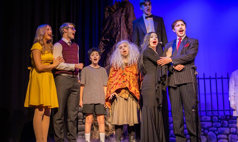 Students perform onstage